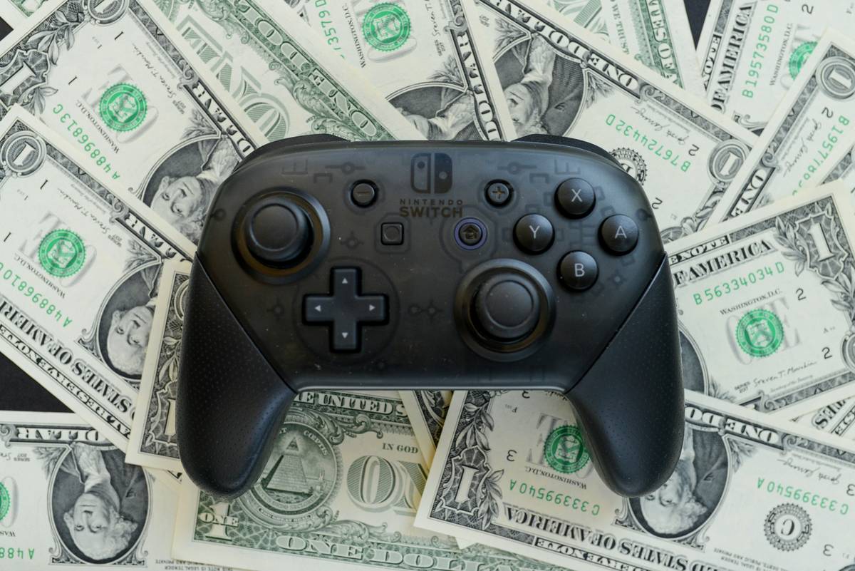 Gamer achieving maximum gaming lifetime subscriptions savings with one-time payment
